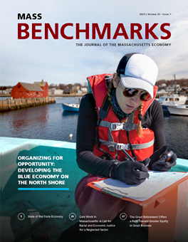 MassBenchmarks cover showing marine biologist working on in a boat.